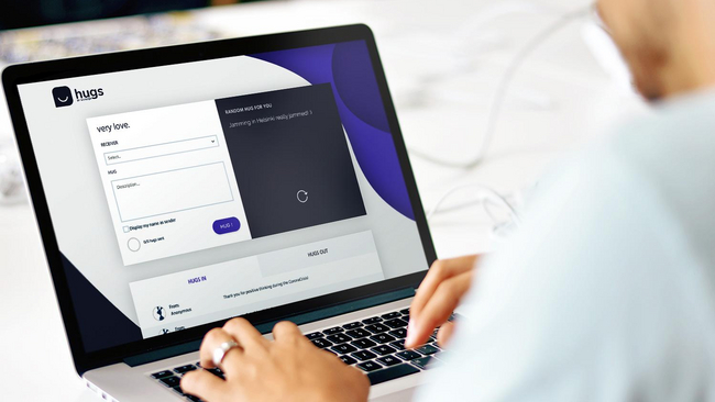 Person using Hugs by Mearra on a laptop.