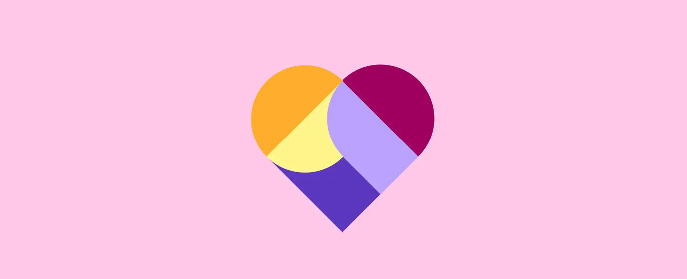 Colorful graphic heart on pink background