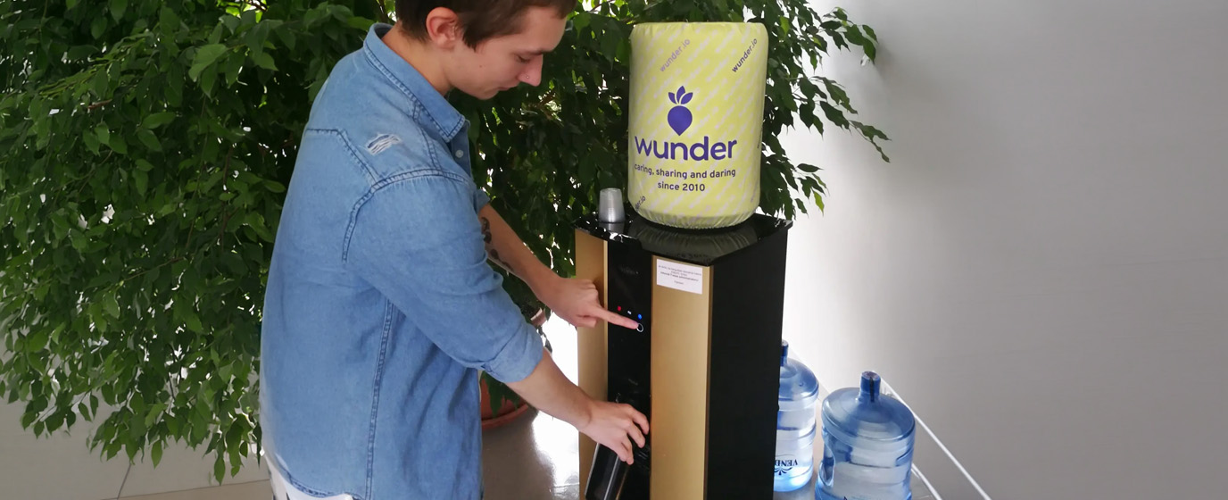 Student pouring water in bottle